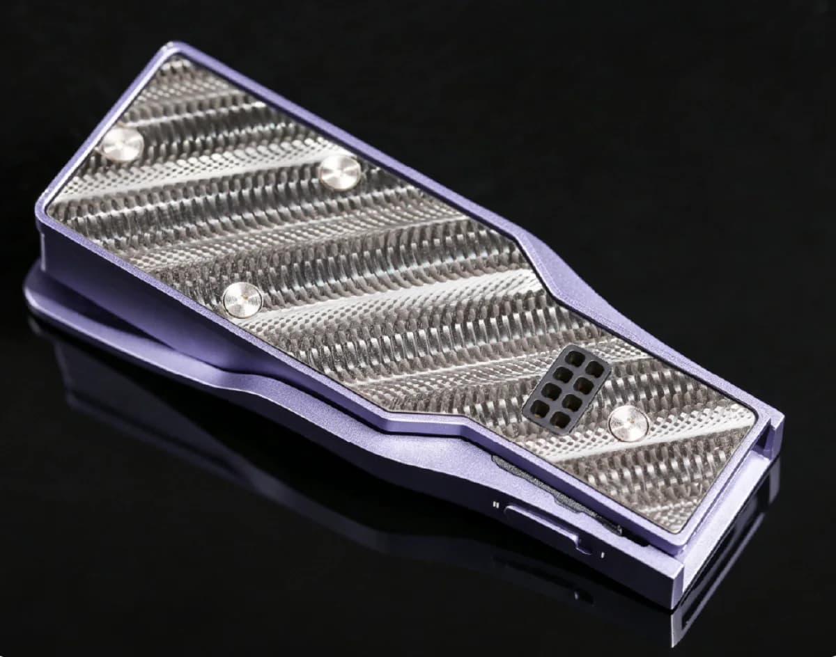 Close view of the purple OPERA S faceplate and its machined underside
